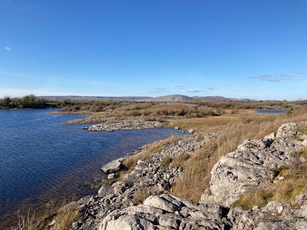 Serene lake in the Burren, Ireland, ideal for fly fishing